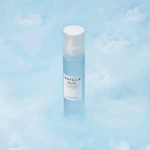 Applying SKIN1004 Cloudy Mist over makeup for refreshing glow