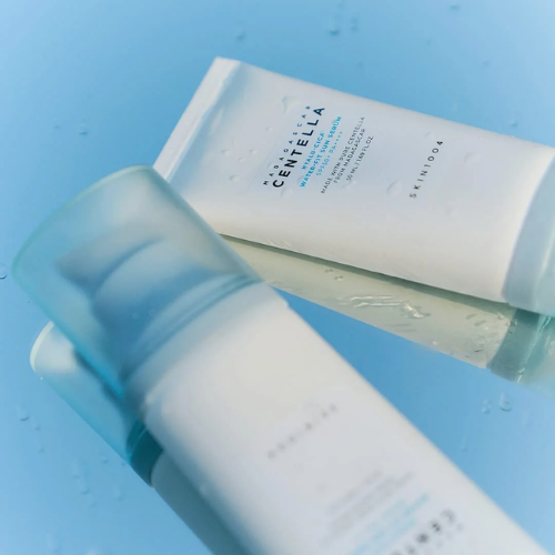 Two 50ml bottles of SKIN1004 Centella Hyalu-Cica Water-Fit Sun Serum side by side