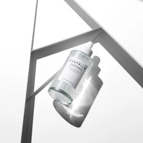 Texture shot of ampoule on hand showing light absorption
