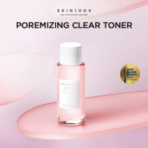 Toner bottle held in hand to show size and transparency