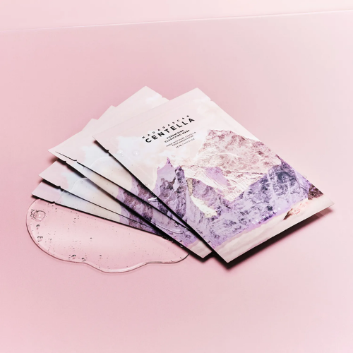Application of SKIN1004 clarifying mask on face in thin layer