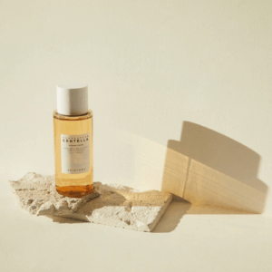 Clear watery texture of SKIN1004 Centella Toning Toner on cotton pad