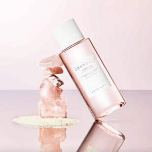 Toner texture shown on cotton pad for gentle exfoliation